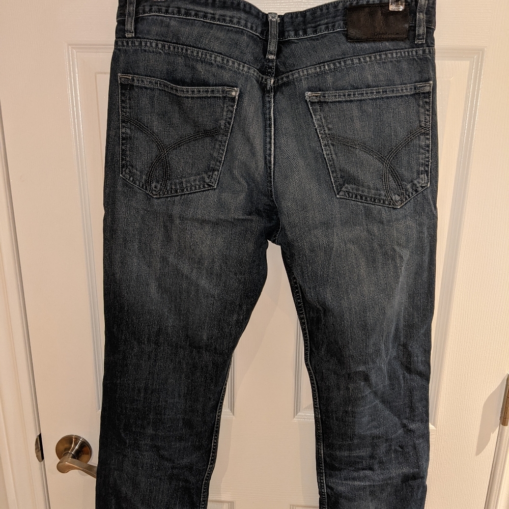 MOVING- offer Calvin Klein dark wash jeans 34 x 32